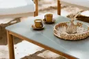 arrangement_of_a_coffee_table_with_accessories_on_the_countertop_5c5f.product_gallery.webp