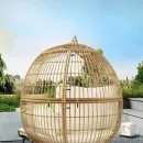 Duzy-rattanowy-fotel-z-podnozkiem-4.webp